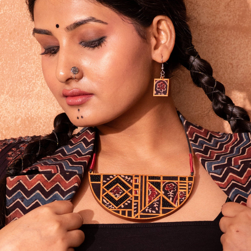 Women wearing upcycled fabric necklace