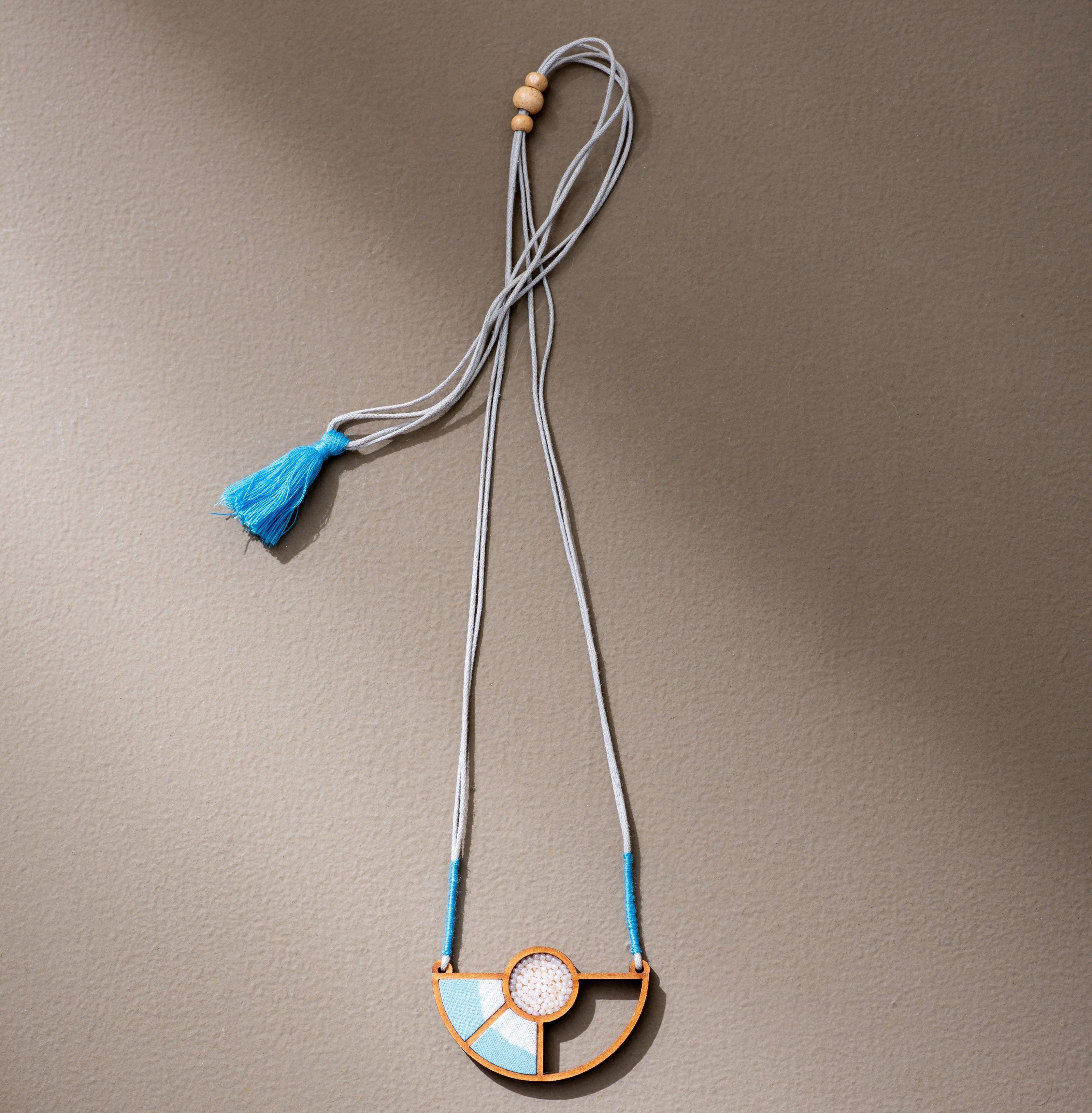 WHE Blue and White Geometrical Repurposed Fabric and Wood Adjustable Pendant Necklace